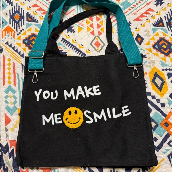 hoodies for heroes Handbags - “You make me smile” tote bag.